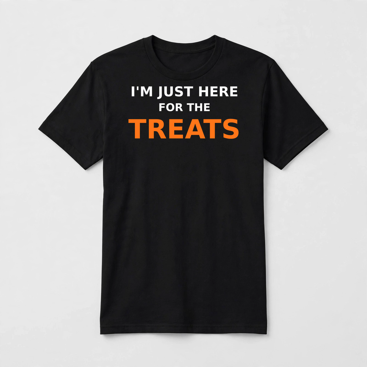 I'm Just Here for the Treats design on a black unisex t-shirt